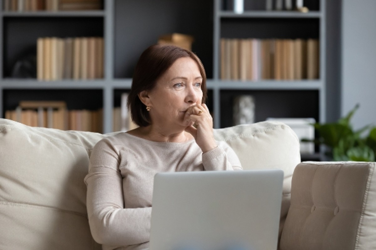 Do I Have to Post an Obituary Do I have to post an obituary woman reading obituary information online and considering announcement